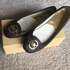 Michael Kors brown slip ons